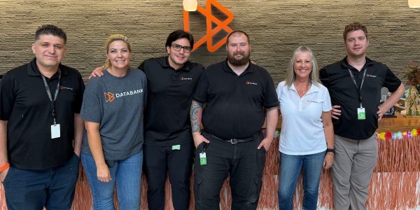 One Team, Two Rounds of Giving: Backpacks for Local Students